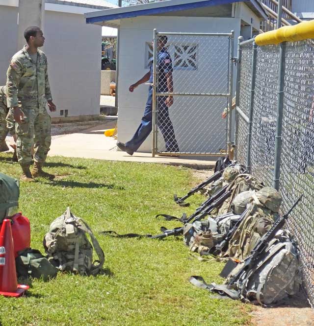 National Guard bringing supplies to the baseball field at Pine Island Center. Access to Pine Island was washed out and cut off.